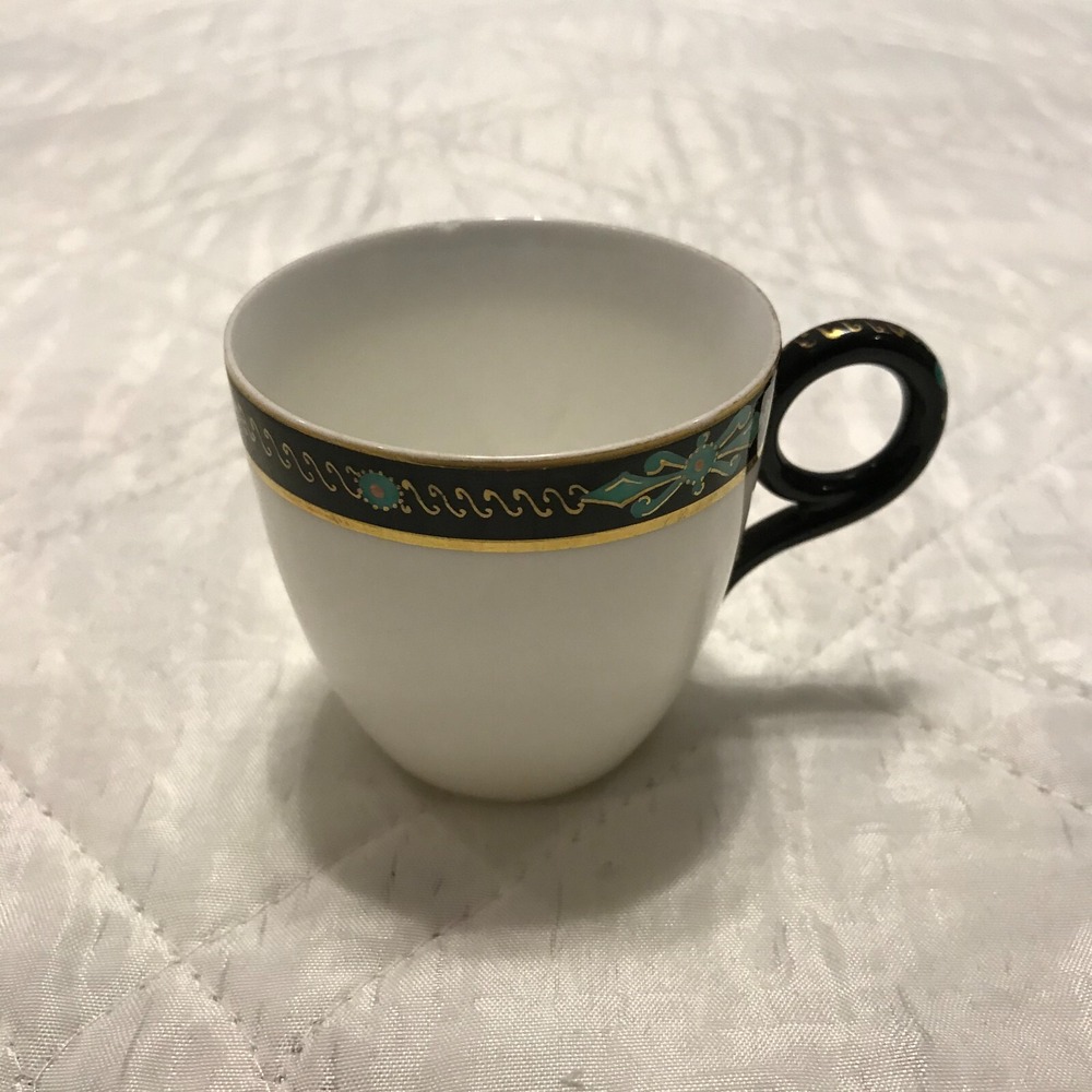 Vintage circle handle Tea‎ Cup